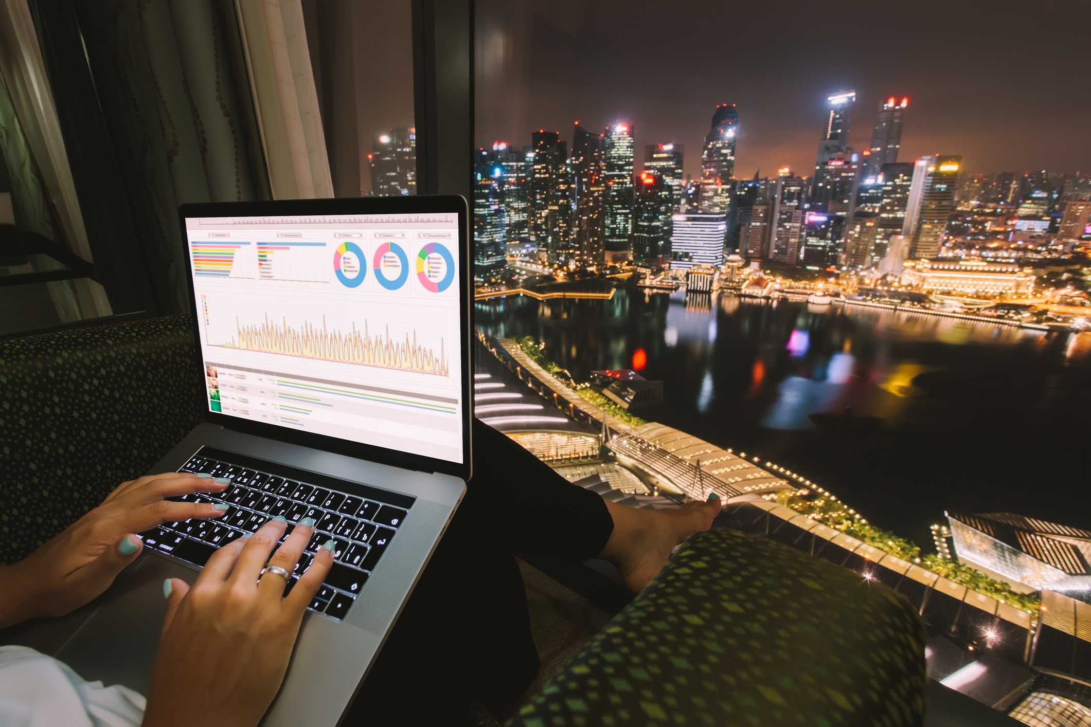Air purifiers and HVAC systems for improved indoor air quality, with a city skyline at night in the background.